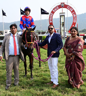 Moonlight Queen (S Saqlain up) winner of the MYSORE CITY GOLD CUP, being led in by trainer Rakesh on Wednesday races at Mysore.